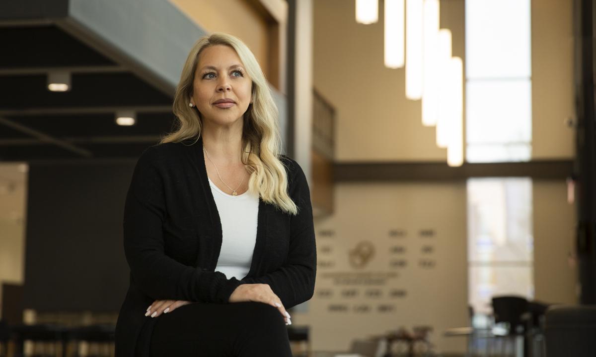 Photo of Nichole Allen sitting and looking off into the distance