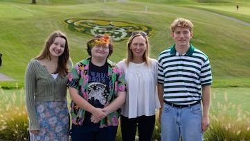 Christie Scoggin pictured with some of the current Scoggin Scholars (left to right) Nate Oberdier, Christie Scoggin, Eden Wiik and Quinn Tansell