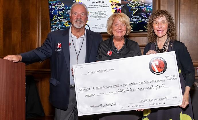 OU President Ora Hirsch-Pescovitz, M.D. with Lynn and Lew LaPaugh, President of the Ted Lindsay Foundation